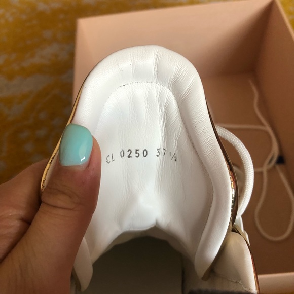 Metallic Gold Louis Vuitton arch light sneakers. - Picture 3 of 7